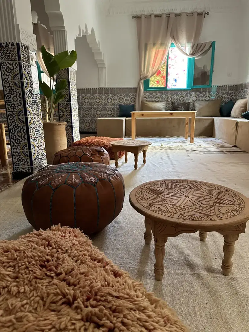 Courtyard lounge with leather poufs