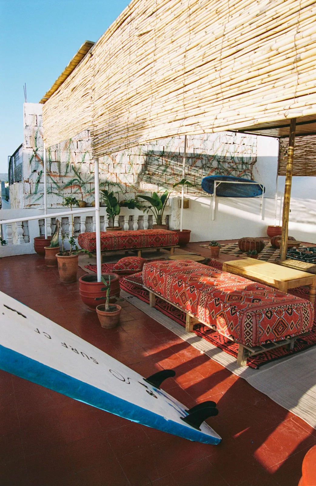 Surfboard resting on the rooftop terrace