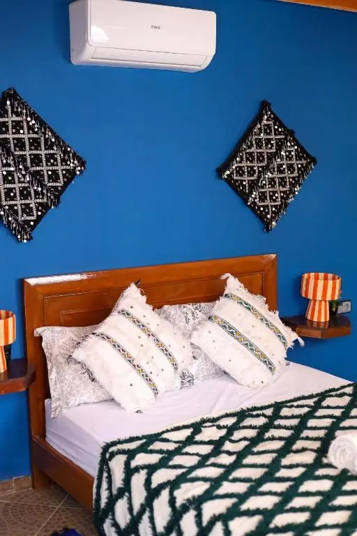Double bed and Berber wall art
