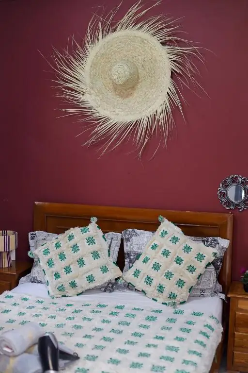 Straw hat above the bed