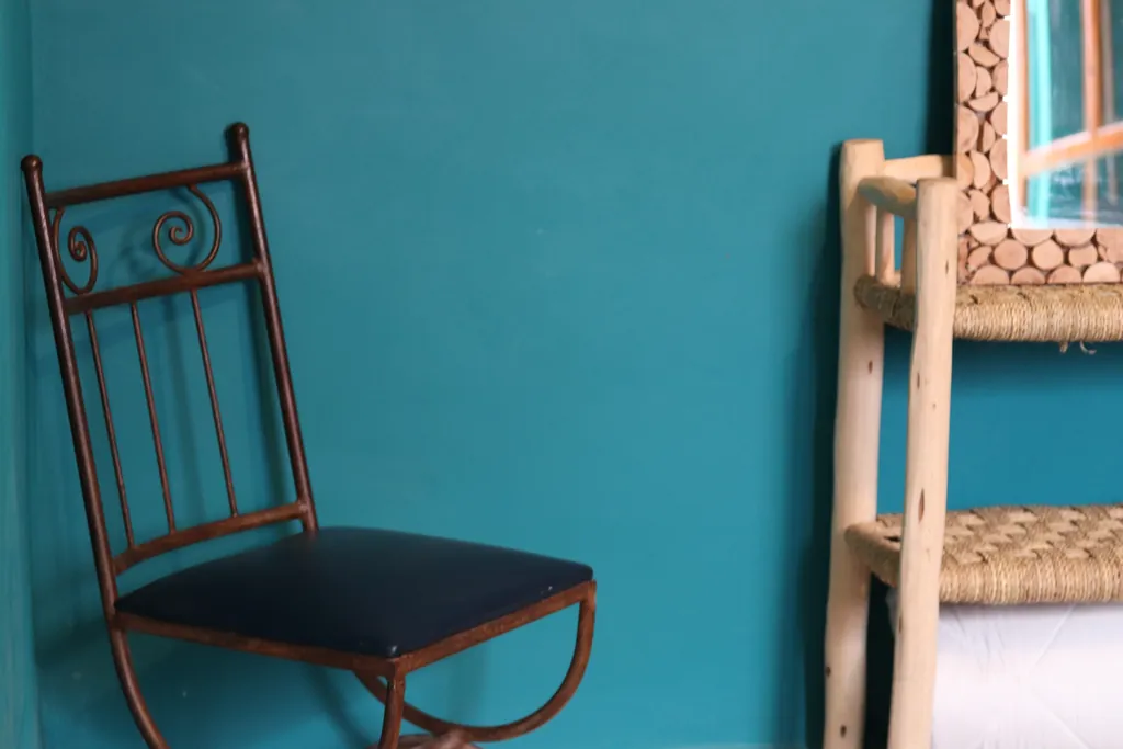 Iron chair and woven shelf