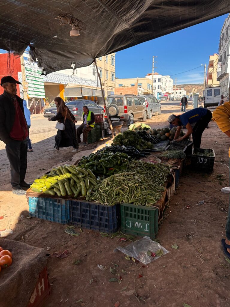 Surfboards lined up on the beach in Tamraght on a sunny December day